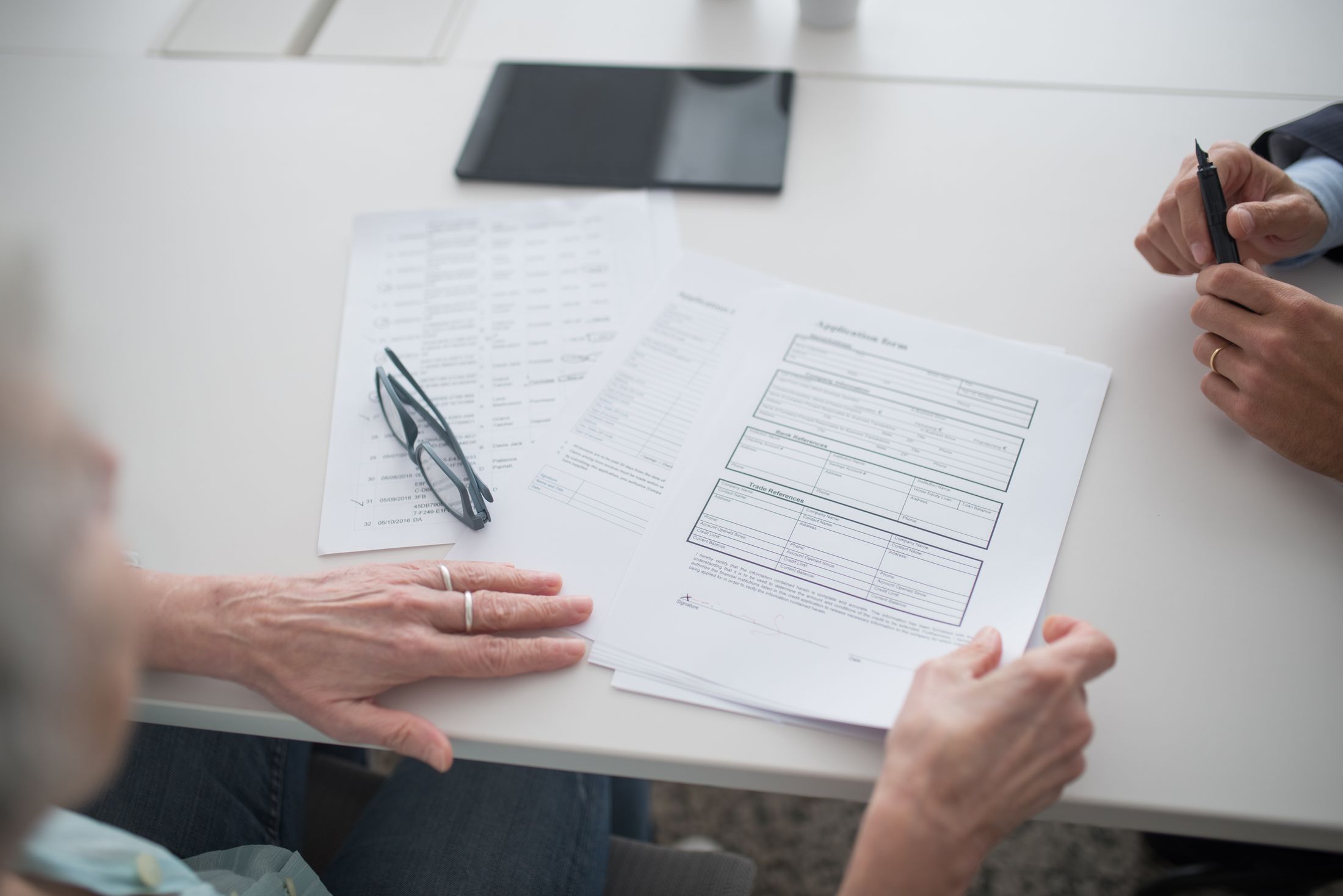 Government service documents being checked by a support specialist